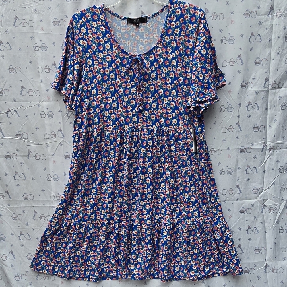 Vibe Sportswear Unior blue micro floral mini dress with short bell sleeve